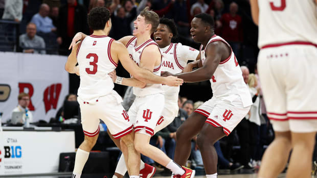 Indiana Hoosiers players celebrate the win after the game against the Penn State Nittany Lions at Target Center.