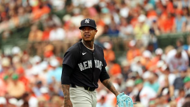 Mar 2, 2024; Sarasota, Florida, USA; New York Yankees starting pitcher Marcus Stroman (0) walks back to the dugout at the end ofd the second inning at Ed Smith Stadium. Mandatory Credit: Kim Klement Neitzel-USA TODAY Sports