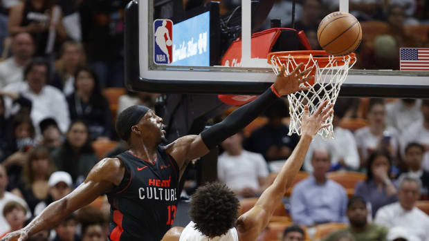Bam Adebayo attempting a block against the Detroit Pistons.