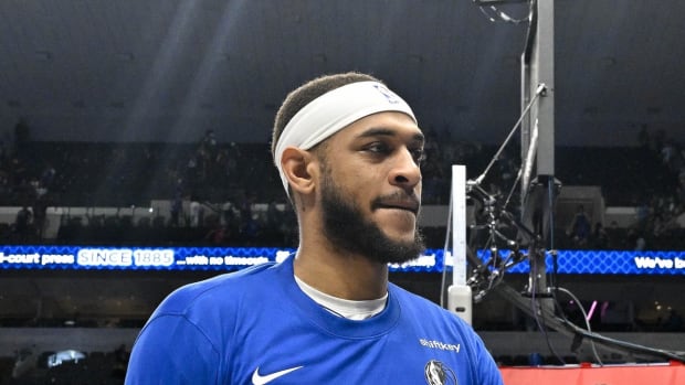 Mar 13, 2024; Dallas, Texas, USA; Dallas Mavericks center Daniel Gafford (21) walks off the court after the game between the Dallas Mavericks and the Golden State Warriors at the American Airlines Center.