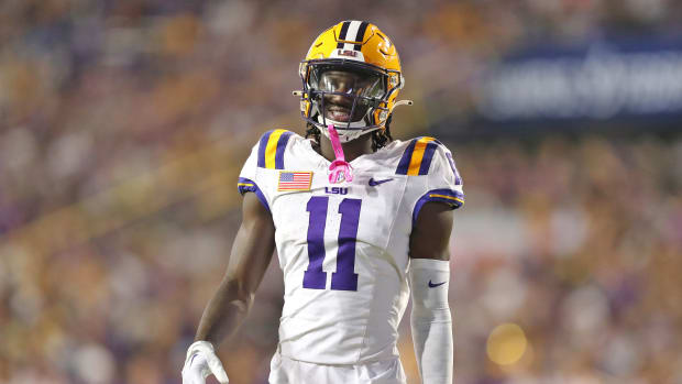Oct 21, 2023; Baton Rouge, Louisiana, USA; LSU Tigers wide receiver Brian Thomas Jr. (11) smiles during the first half against the Army Black Knights at Tiger Stadium. Mandatory Credit: Danny Wild-USA TODAY Sports  