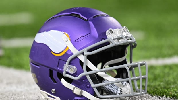 Nov 27, 2023; Minneapolis, Minnesota, USA; A Minnesota Vikings helmet sits idle on the field before the game between the Minnesota Vikings and the Chicago Bears at U.S. Bank Stadium.