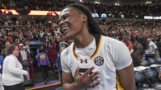 Mar 9, 2024; Greenville, SC, USA; South Carolina Gamecocks guard MiLaysia Fulwiley (12) celebrates with teammates after center Kamilla Cardoso (not pictured) made a game winning shot to beat the Tennessee Lady Vols at the Bon Secours Wellness Arena.