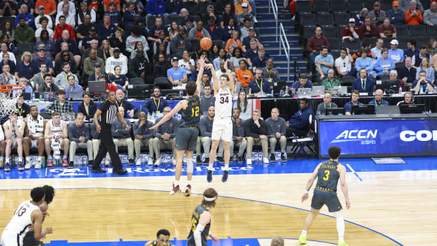Jake Groves shoots a three-pointer during the Virginia men's basketball game against Boston College in the quarterfinals of the 2024 ACC Men's Basketball Tournament at Capital One Arena.