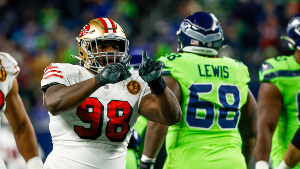 Nov 23, 2023; Seattle, Washington, USA; San Francisco 49ers defensive tackle Javon Hargrave (98) celebrates after a sack against the Seattle Seahawks during the second quarter at Lumen Field. Mandatory Credit: Joe Nicholson-USA TODAY Sports  