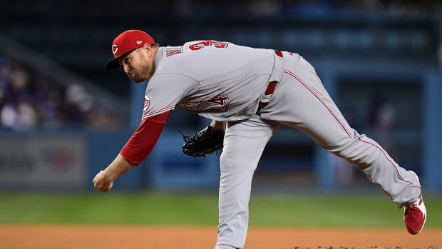Apr 14, 2022; Los Angeles, California, USA; Cincinnati Reds relief pitcher Justin Wilson (34) throws against the Los Angeles Dodgers during the eighth inning at Dodger Stadium. Mandatory Credit: Gary A. Vasquez-USA TODAY Sports  