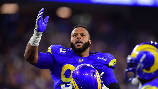 Jan 30, 2022; Inglewood, California, USA; Los Angeles Rams defensive end Aaron Donald (99) celebrates in the fourth quarter during the NFC Championship Game against the San Francisco 49ers at SoFi Stadium. Mandatory Credit: Gary A. Vasquez-USA TODAY Sports  
