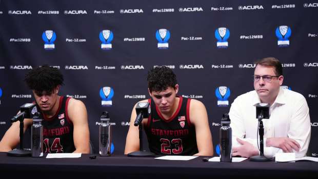 Mar 14, 2024; Las Vegas, NV, USA; Stanford Cardinal forwards Spencer Jones (14) and Brandon Allen (23) and head coach Jerod Haase react at press conference after the game against the Washington State Cougars at T-Mobile Arena. Mandatory Credit: Kirby Lee-USA TODAY Sports