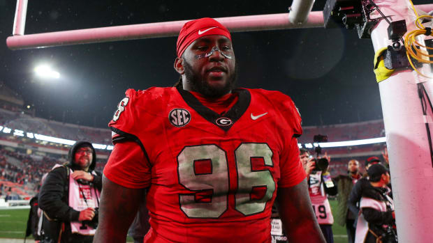 Nov 11, 2023; Athens, Georgia, USA; Georgia Bulldogs defensive lineman Zion Logue (96) walks off the field after a victory against the Mississippi Rebels at Sanford Stadium.