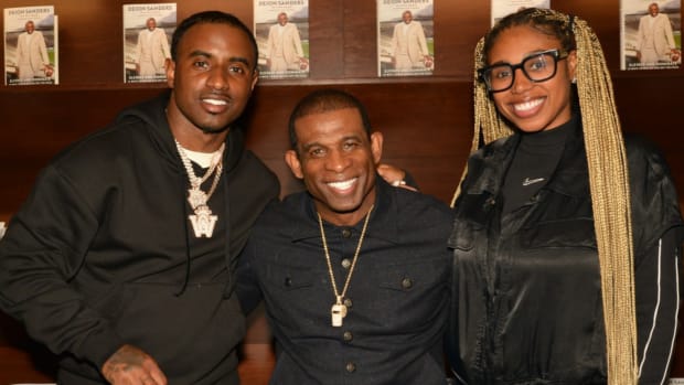 Deion Sanders with his kids at Atlanta book tour stop