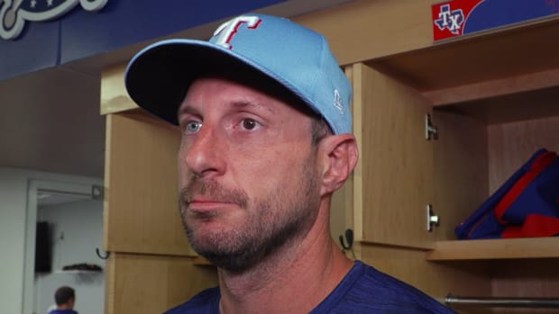 Texas Rangers right-hander Max Scherzer returned to the club's spring training complex in Surprise, Ariz., on Friday after spending the past few weeks rehabbing from December back surgery at his home in Florida.