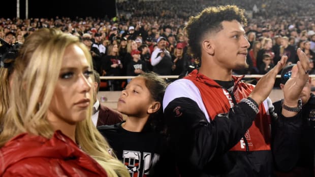 Brittany and Patrick Mahomes attend a Texas Tech football game.