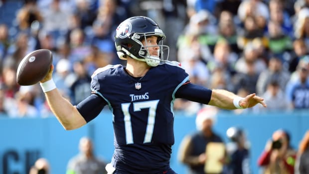 Tennessee Titans quarterback Ryan Tannehill (17) drops back to pass during the first half against the Seattle Seahawks at Nissan Stadium.
