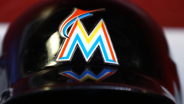 Generic Jul 22, 2015; Phoenix, AZ, USA; Detailed view of the Miami Marlins logo on a batting helmet in the dugout against the Arizona Diamondbacks at Chase Field. Mandatory Credit: Mark J. Rebilas-USA TODAY Sports