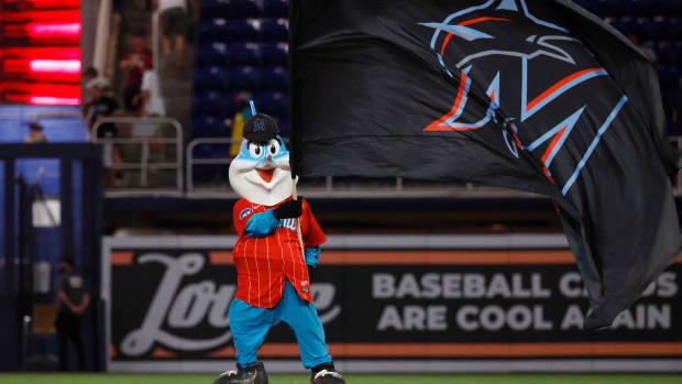 Generic Jun 3, 2023; Miami, Florida, USA; Miami Marlins mascot Billy the Marlin waves a flag in the outfield against the Oakland Athletics following the game at loanDepot Park. Mandatory Credit: Rhona Wise-USA TODAY Sports