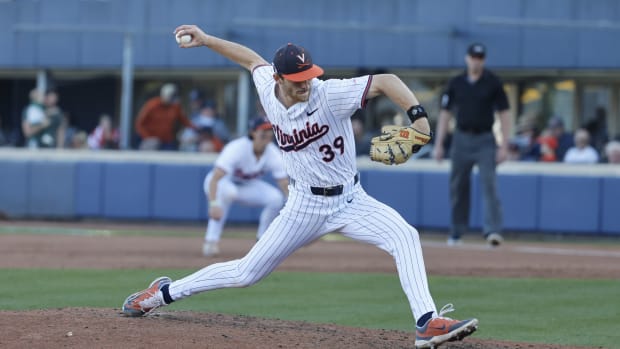 Chase Hungate delivers a pitch during the Virginia baseball game against Wake Forest at Disharoon Park.