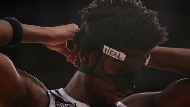 Mar 15, 2024; New York City, NY, USA; Providence Friars guard Ticket Gaines (0) adjusts his face mask during the second half against the Marquette Golden Eagles at Madison Square Garden. Mandatory Credit: Brad Penner-USA TODAY Sports