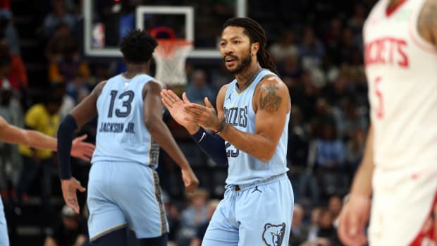 Dec 15, 2023; Memphis, Tennessee, USA; Memphis Grizzlies guard Derrick Rose (23) reacts during the first half against the Houston Rockets at FedExForum.