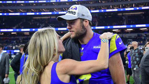 Los Angeles Rams quarterback Matthew Stafford (9) with wife Kelly Hall after defeating the San Francisco 49ers in the NFC Championship Game at SoFi Stadium.