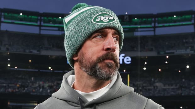 Dec 24, 2023; East Rutherford, New Jersey, USA; New York Jets quarterback Aaron Rodgers (8) on the field after the game against the Washington Commanders at MetLife Stadium. 