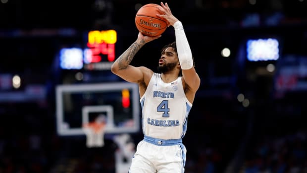 North Carolina Tar Heels guard RJ Davis (4) shoots the ball against the North Carolina State Wolfpack during the second half at Capital One Arena in Washington, D.C., on March 16, 2024.