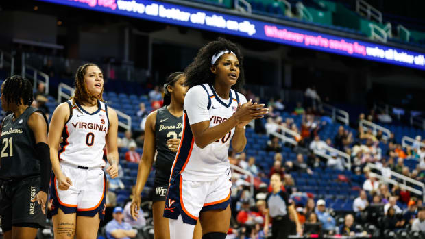 Camryn Taylor and Olivia McGhee react during the Virginia women's basketball game against Wake Forest in the first round of the 2024 ACC Women's Basketball Tournament at Greensboro Coliseum.