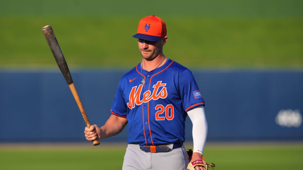 Mar 12, 2024; West Palm Beach, Florida, USA; New York Mets first baseman Pete Alonso (20) warms-up before the start of the game against the Washington Nationals at CACTI Park of the Palm Beaches.