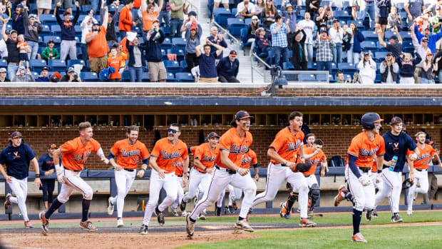 The Virginia baseball team celebrates after defeating Wake Forest on a walk-off at Disharoon Park.