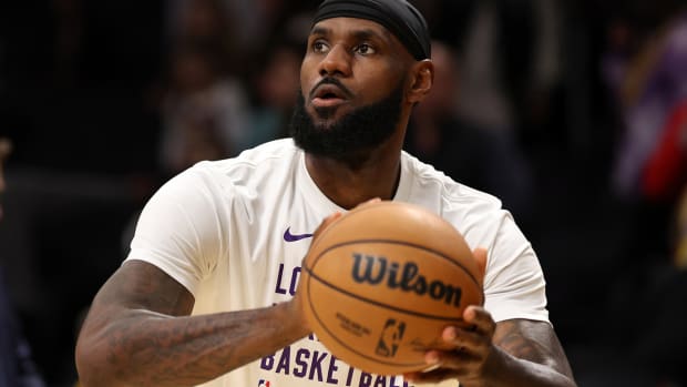 Los Angeles Lakers forward LeBron James takes a practice shot before his team’s game against the Minnesota Timberwolves on March 10, 2024.