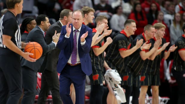 Wisconsin Badgers head coach Greg Gard celebrates during the first half against the Ohio State Buckeyes at Value City Arena
