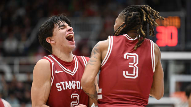 Feb 10, 2024; Stanford, California, USA; Stanford Cardinal guard Andrej Stojakovic (2) celebrates with guard Kanaan Carlyle (3) after scoring a three-point basket against the USC Trojans during the first half at Maples Pavilion. Mandatory Credit: Robert Edwards-USA TODAY Sports