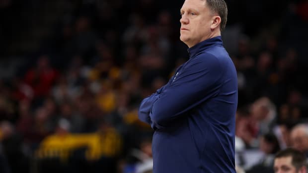 Penn State basketball coach Mike Rhoades watches his team during a Big Ten Tournament game against Indiana.