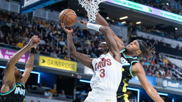 Nov 3, 2023; Indianapolis, Indiana, USA; Cleveland Cavaliers guard Caris LeVert (3) shoots the ball while Indiana Pacers center Myles Turner (33) defends in the second half at Gainbridge Fieldhouse.