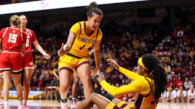 Minnesota forward Ayianna Johnson (1) reacts after guard Janay Sanders (30) draws a foul during the first half against Wisconsin at Williams Arena in Minneapolis on Feb. 20, 2024.