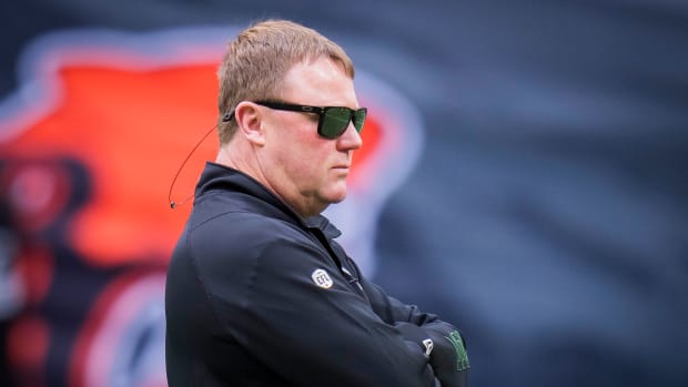 Jun 17, 2023; Vancouver, British Columbia, CAN; Edmonton Elks head coach and general manager Chris Jones watches his players during warm up prior to a game against the BC Lions at BC Place. Mandatory Credit: Bob Frid-USA TODAY Sports  