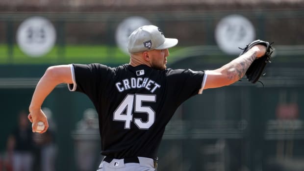 Feb 27, 2024; Phoenix, Arizona, USA; Chicago White Sox starting pitcher Garrett Crochet (45) pitches against the Los Angeles Dodgers during the first inning at Camelback Ranch-Glendale.