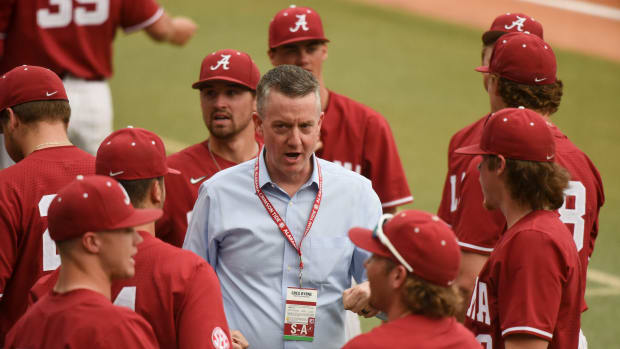 April 4, 2023; Tuscaloosa, AL, USA; Alabama Athletic Director Greg Byrne talks to baseball players before a Tuesday night contest against Troy. Baseball Alabama Vs Troy