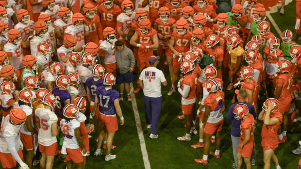 Clemson head coach Dabo Swinney in a player huddle during Spring practice at the Poe Indoor Practice Facility at the Allen N. Reeves football complex in Clemson S.C. Friday, March 1, 2024.  