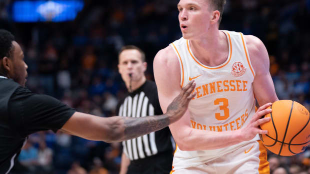 Tennessee Volunteers guard Dalton Knecht (3) looks to pass against Mississippi State during their SEC Men's Basketball Tournament quarterfinal game at Bridgestone Arena in Nashville, Tenn., Friday, March 15, 2024.  