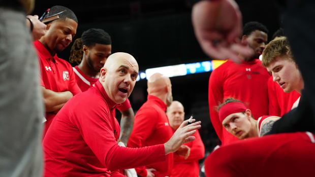 Mar 14, 2024; Las Vegas, NV, USA; Utah Utes head coach Craig Smith talks to players during the second half against the Colorado Buffaloes at T-Mobile Arena. Mandatory Credit: Stephen R. Sylvanie-USA TODAY Sports
