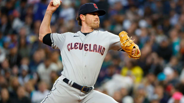 Mar 30, 2023; Seattle, Washington, USA; Cleveland Guardians starting pitcher Shane Bieber (57) throws against the Seattle Mariners during the first inning at T-Mobile Park.