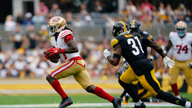 Sep 10, 2023; Pittsburgh, Pennsylvania, USA; San Francisco 49ers wide receiver Brandon Aiyuk (11) runs with the ball after making a catch against the Pittsburgh Steelers during the first half at Acrisure Stadium. Mandatory Credit: Gregory Fisher-USA TODAY Sports  