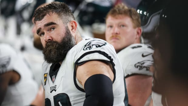 Jason Kelce looks over his<br />
                                                                                 shoulder as he sits down in an Eagles<br />
                                                                                 uniform