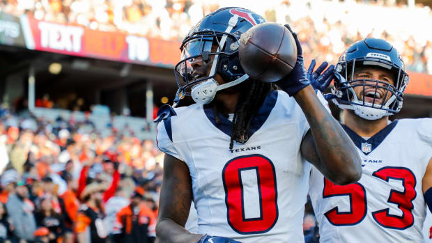 Nov 12, 2023; Cincinnati, Ohio, USA; Houston Texans cornerback Shaquill Griffin (0) reacts after intercepting the ball against the Cincinnati Bengals in the second half at Paycor Stadium.