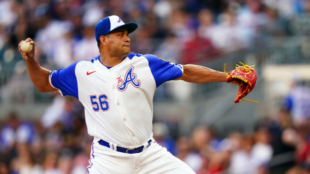 Aug 19, 2023; Cumberland, Georgia, USA; Atlanta Braves relief pitcher Yonny Chirinos (56) cycles through a pitch against the San Francisco Giants during the first inning at Truist Park. Mandatory Credit: John David Mercer-USA TODAY Sports