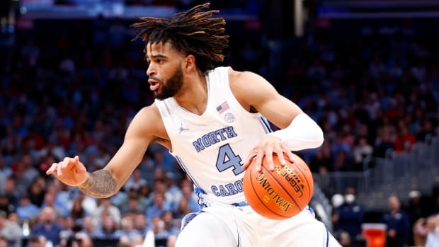 North Carolina Tar Heels guard RJ Davis (4) dribbles the ball against the North Carolina State Wolfpack during the first half at Capital One Arena in Washington, D.C., on March 16, 2024.