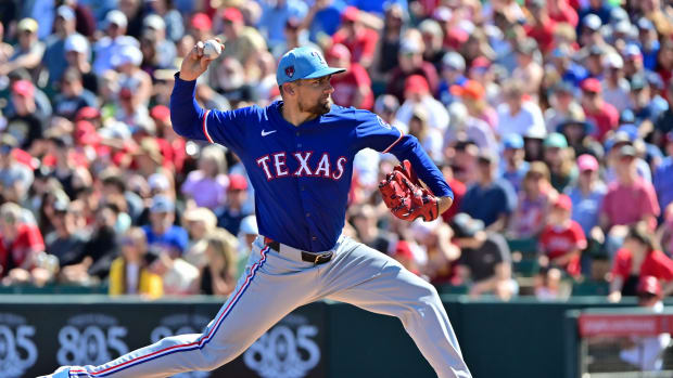 Mar 11, 2024; Tempe, Arizona, USA; Texas Rangers starting pitcher Nathan Eovaldi (17) throws in the first inning against the Los Angeles Angels during a spring training game at Tempe Diablo Stadium.