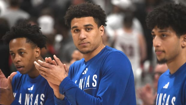 Kansas guard Kevin McCullar Jr. (15) claps during warmups before the Big 12 basketball game against Texas Tech, Monday, Feb. 12, 2024, at United Supermarkets Arena.
