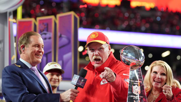 Feb 11, 2024; Paradise, Nevada, USA; Kansas City Chiefs head coach Andy Reid celebrates while being interviewed by CBS commentator Jim Nantz after winning Super Bowl LVIII against the San Francisco 49ers at Allegiant Stadium.