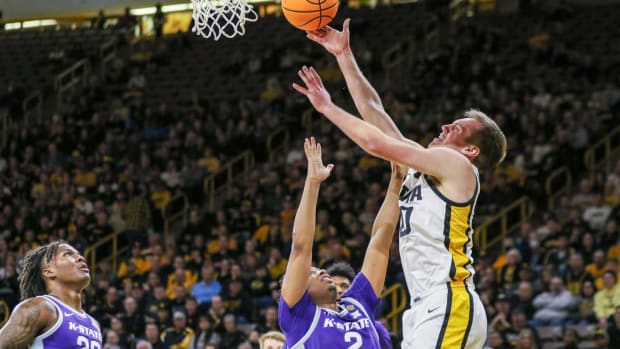 Iowa's Payton Sandfort (20) shoots during a first-round NIT game against Kansas State on March 19, 2024 in Iowa City, Iowa. (Rob Howe/HN)